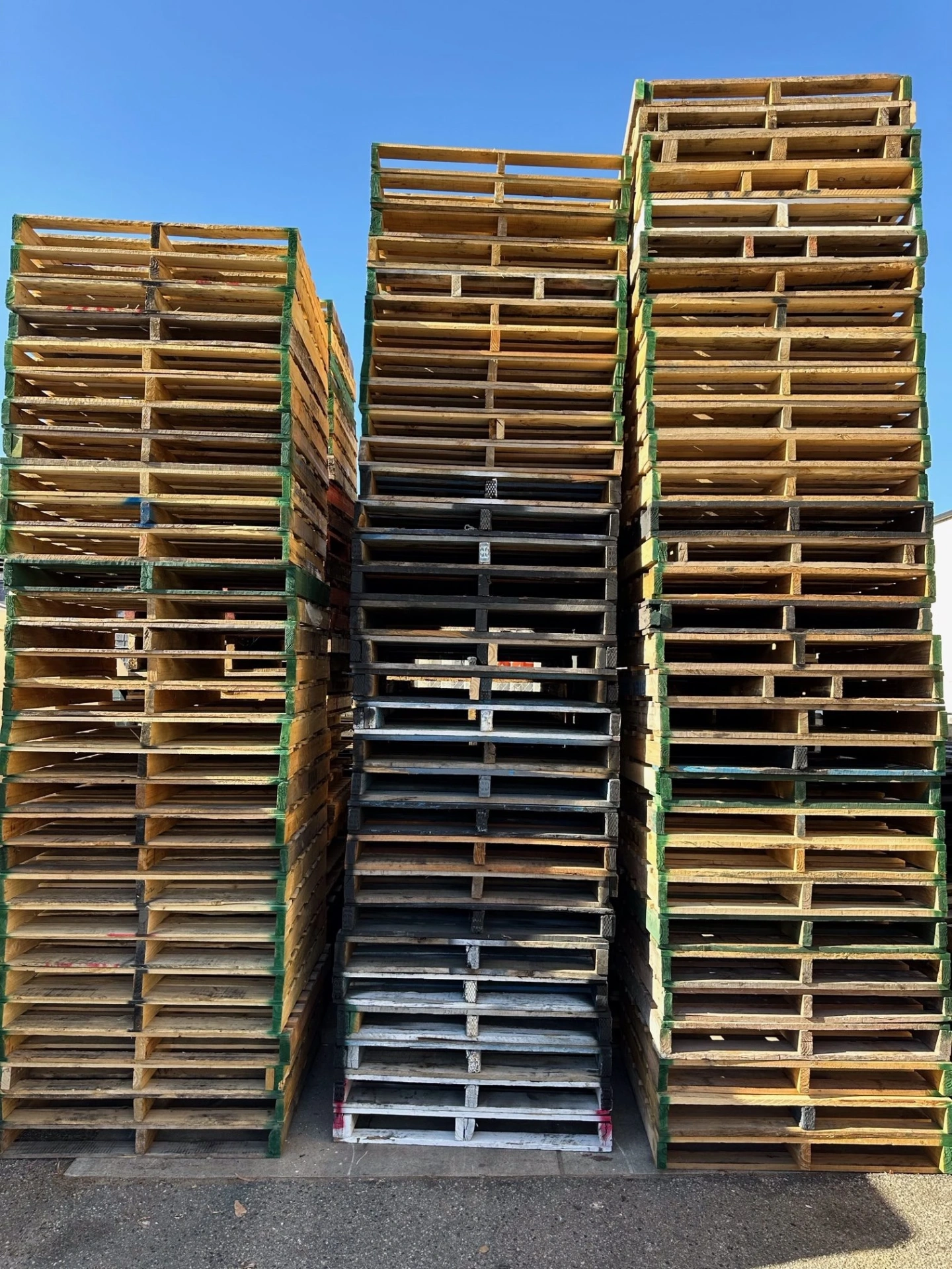 Wide pallet stock under blue sky